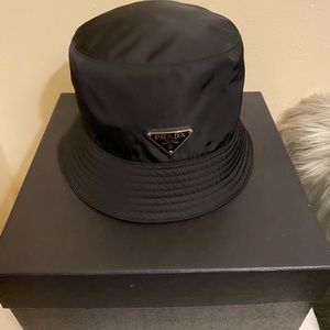 Prada bucket hat.
